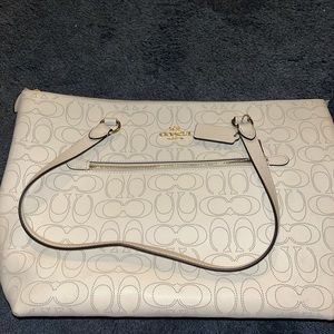 women’s white and gold coach purse